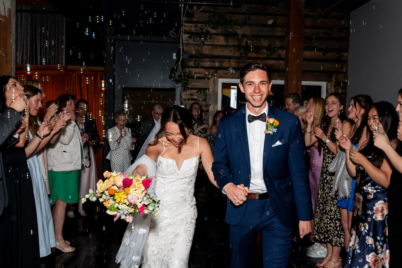 Bride and groom grand entrance with bubbles at The Beaumont